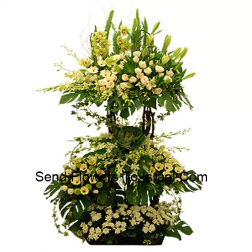 A Tall Arrangement Of Assorted White Flowers