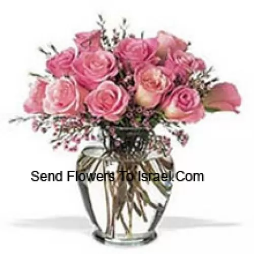 Bunch Of 12 Pink Roses With Some Ferns In A Vase