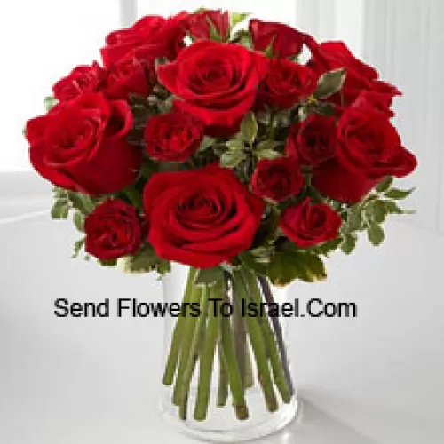 18 Red Colored Roses In A Glass Vase